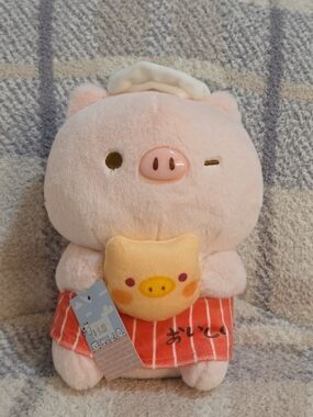 Plush Pink Pig Holding Snack